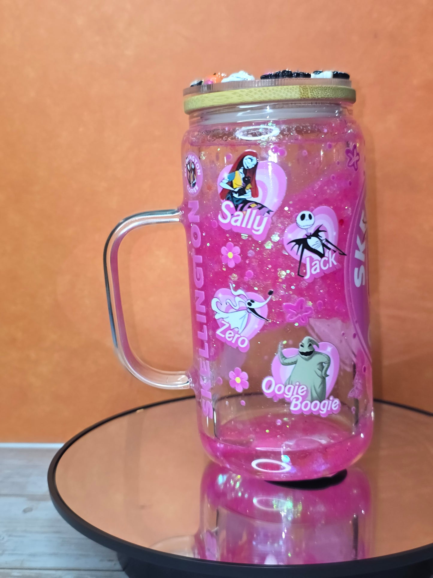 Lava Drip Tumblers with a decorated removable lid