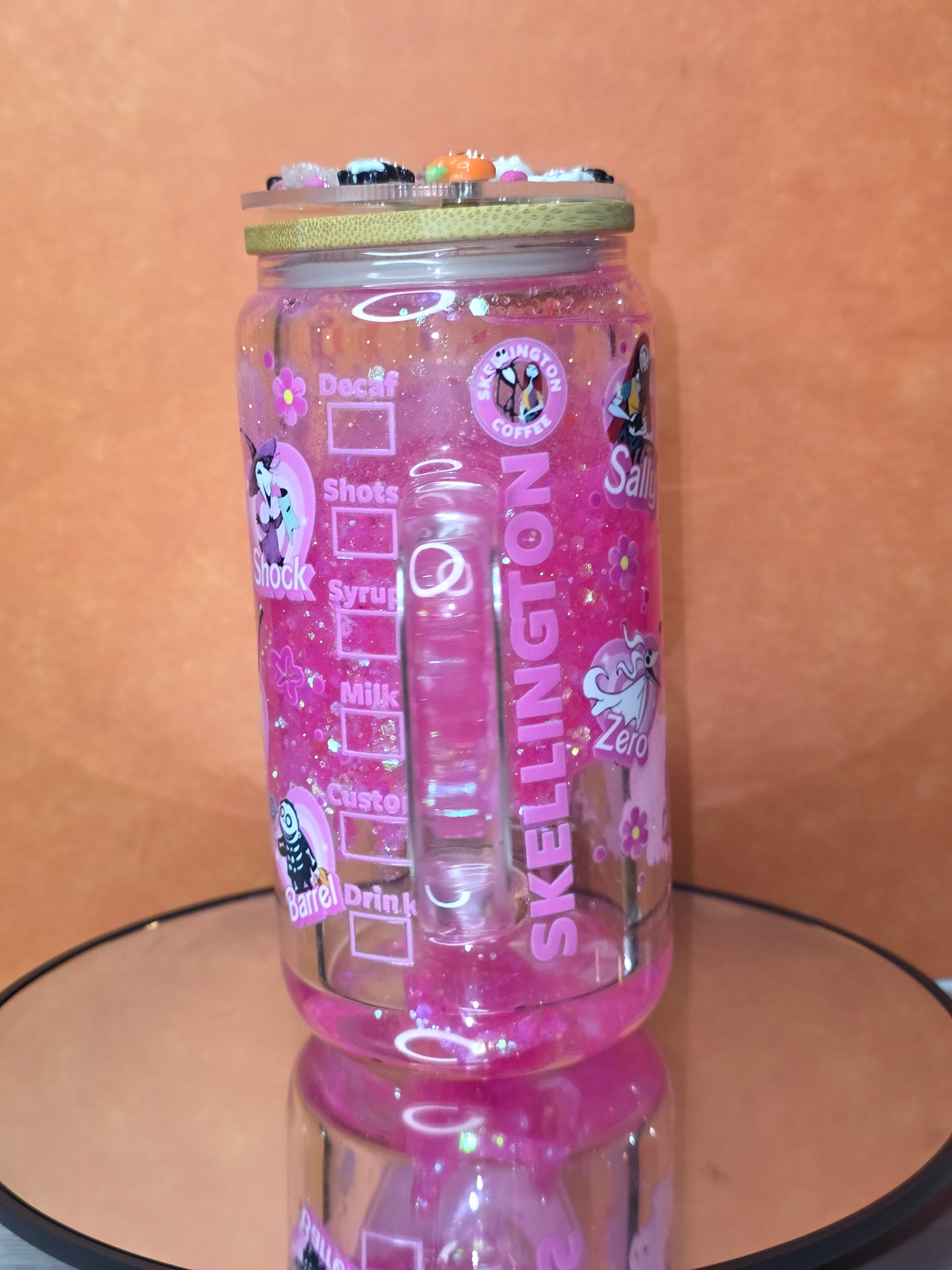 Lava Drip Tumblers with a decorated removable lid