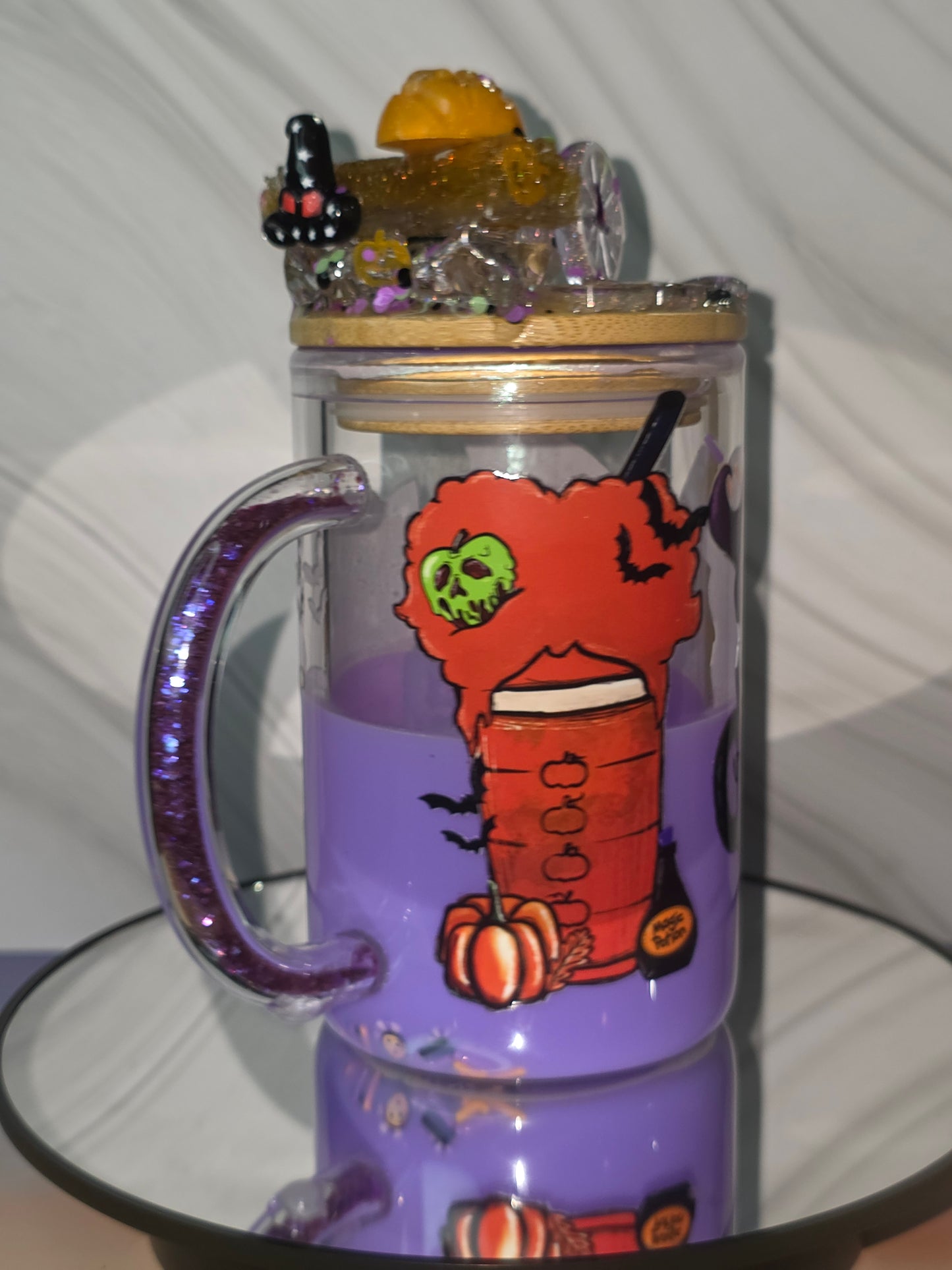 Lava Drip Tumblers with a decorated removable lid